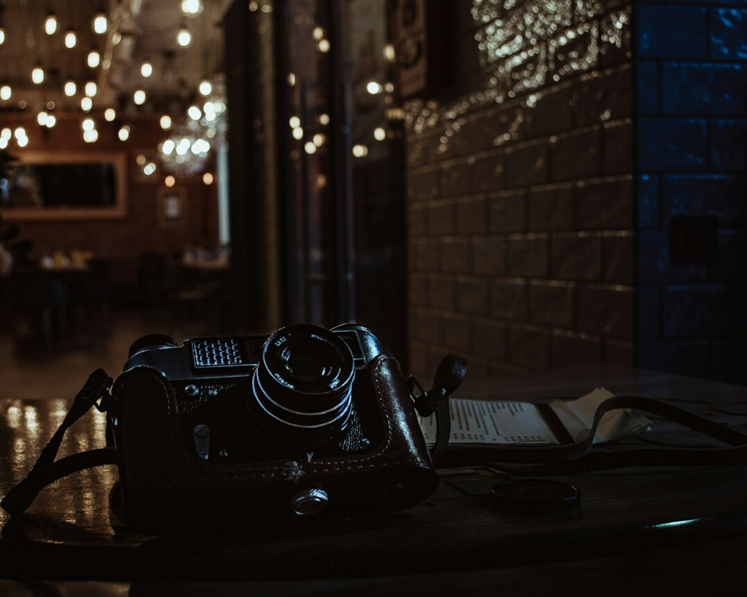 Film crew camera and lights on a studio set